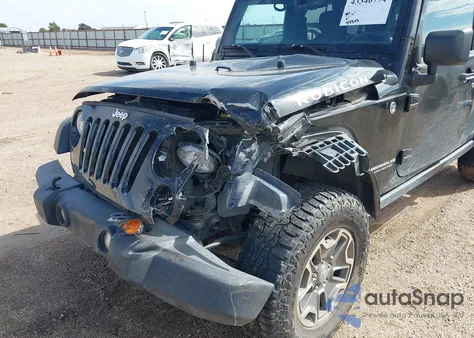2015 Jeep Wrangler Unlimited Rubicon from USA, damaged, VIN 1C4BJWFGXFL598828